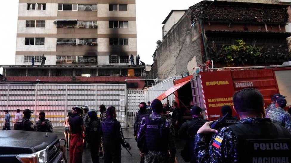 Security forces check a building after explosions near the place where President Maduro was speaking. Photo: 4 August 2018