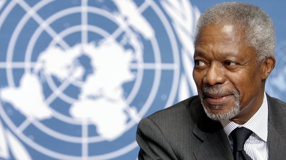 United Nations (UN) Secretary General Kofi Annan smiles in front of UN logo at a press conference 21 November 2006