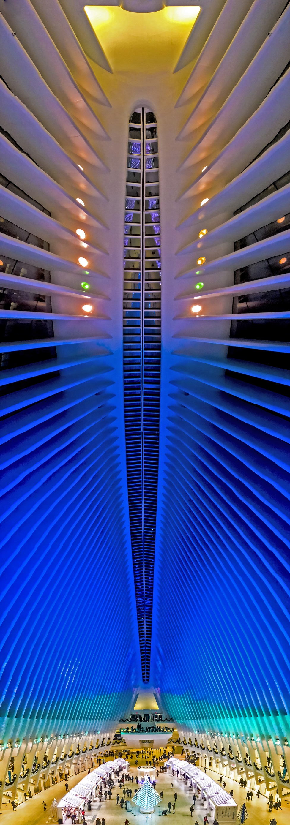 A large arched ceiling in a shopping centre