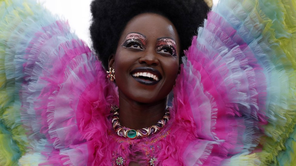 Lupita Nyong'o smiles