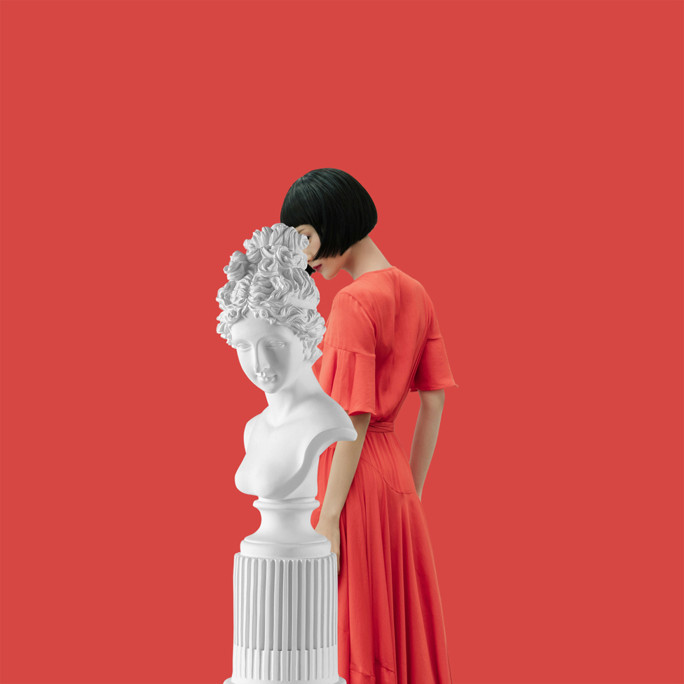 Woman and statue