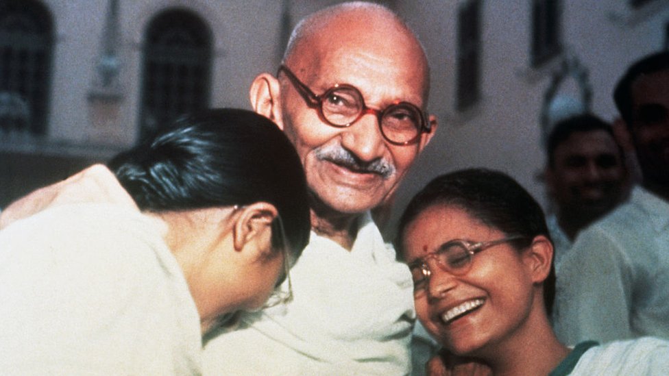 Mahatma Ghandi enjoys a laugh with his two granddaughters Ava and Manu at Birla House in New Delhi.