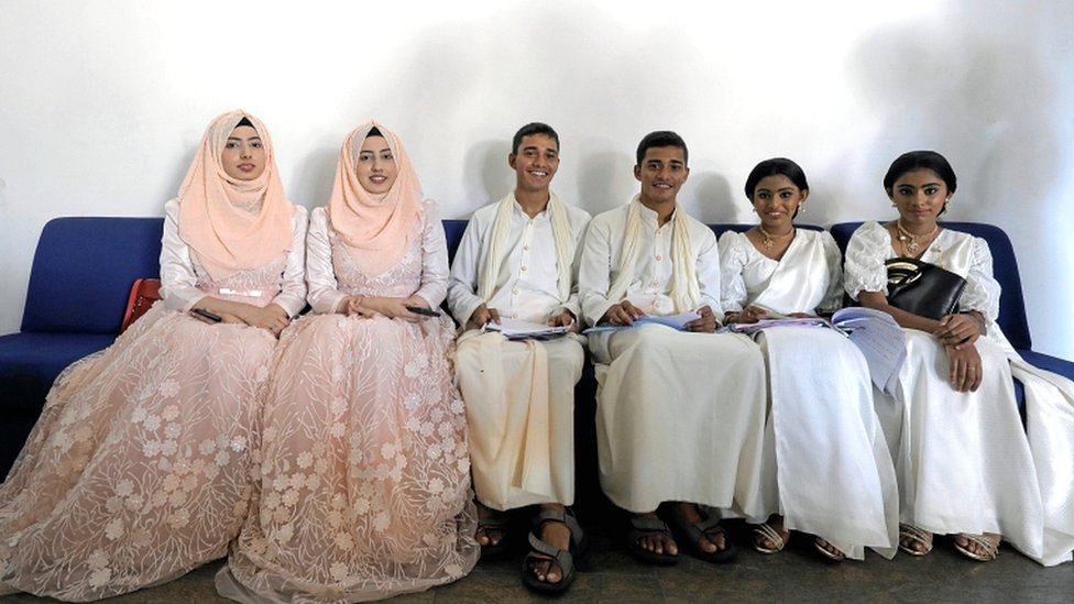 Twins pose for photographs at the Sri Lanka Twins event in Colombo, Sri Lanka, on 20 January 2020