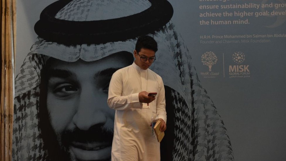 Economic conference delegate in front of a portrait of Saudi Crown Prince Mohammed bin Salman in Riyadh (file photo)