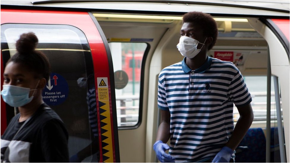 Person getting off the tube