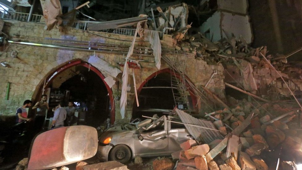 This picture taken on August 4, 2020 shows a general view of destruction along a street in the centre of Lebanon's capital Beirut