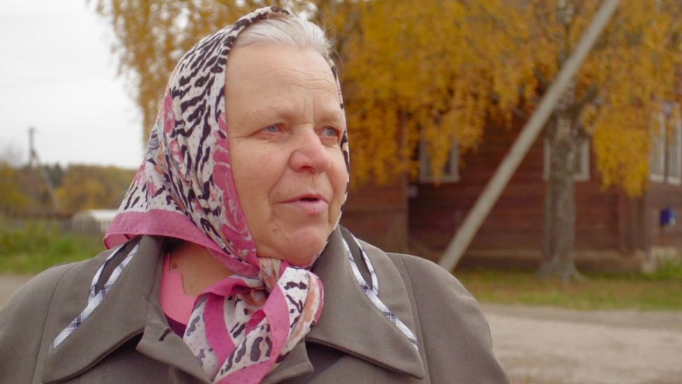 A woman who supports Udgodskaya speaks to the camera