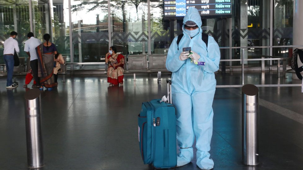 A Passenger with protective gear arrive Netaji Subhash Chandra Bose International Airport in Kolkata on September 03,2020.