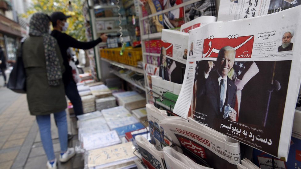 A copy of Iranian daily newspaper Shargh, with a picture of US president-elect Joe Biden and headline 