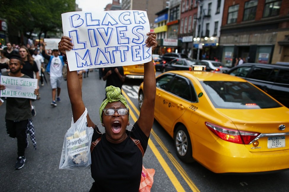 People take part in a protest on 8 July 2016 in New York City