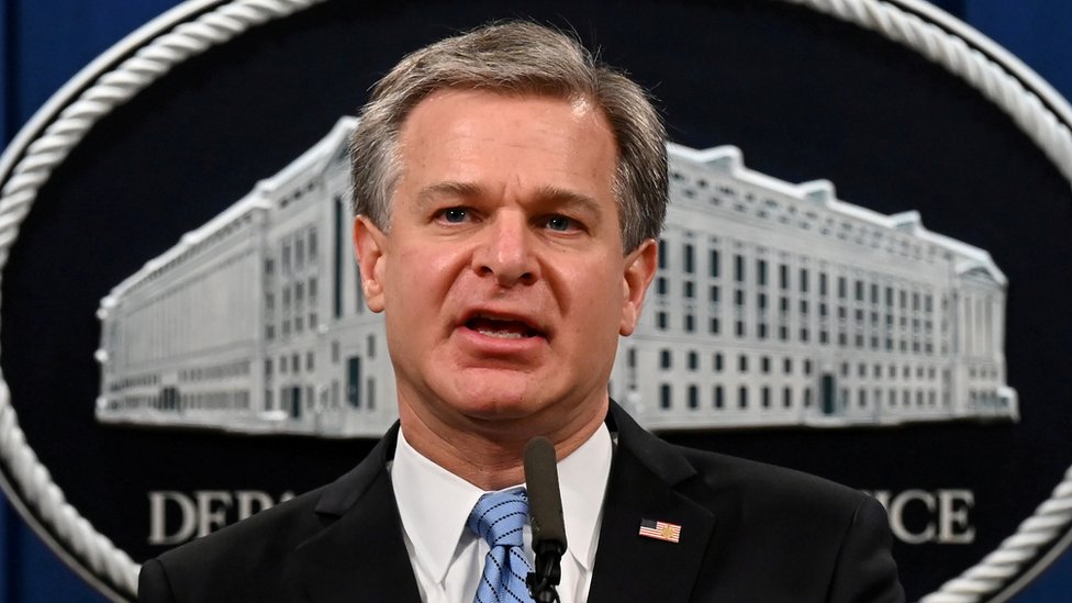 FBI Director Christopher Wray speaks during a press conference on a national security matter at the Department of Justice in Washington