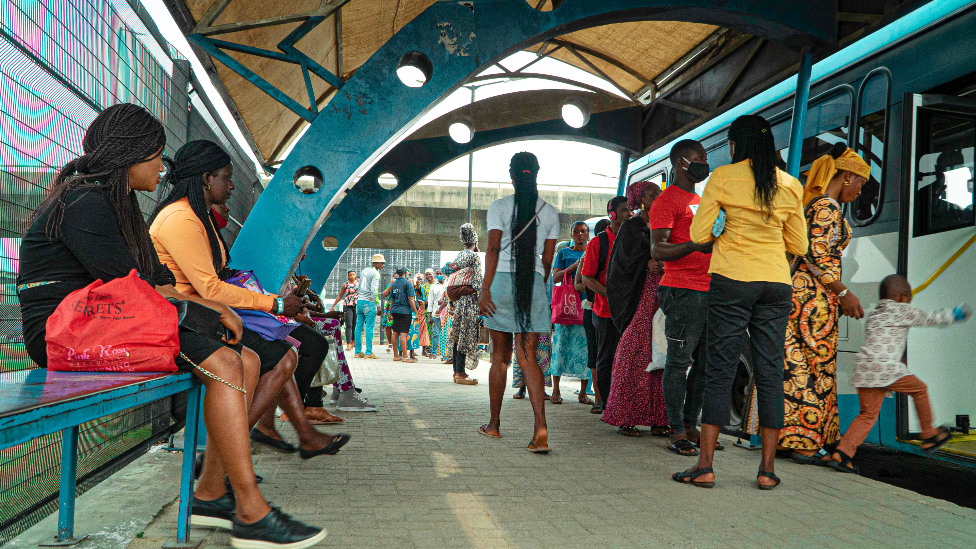 Commuters at a bus stop in Lagos,Nigeria