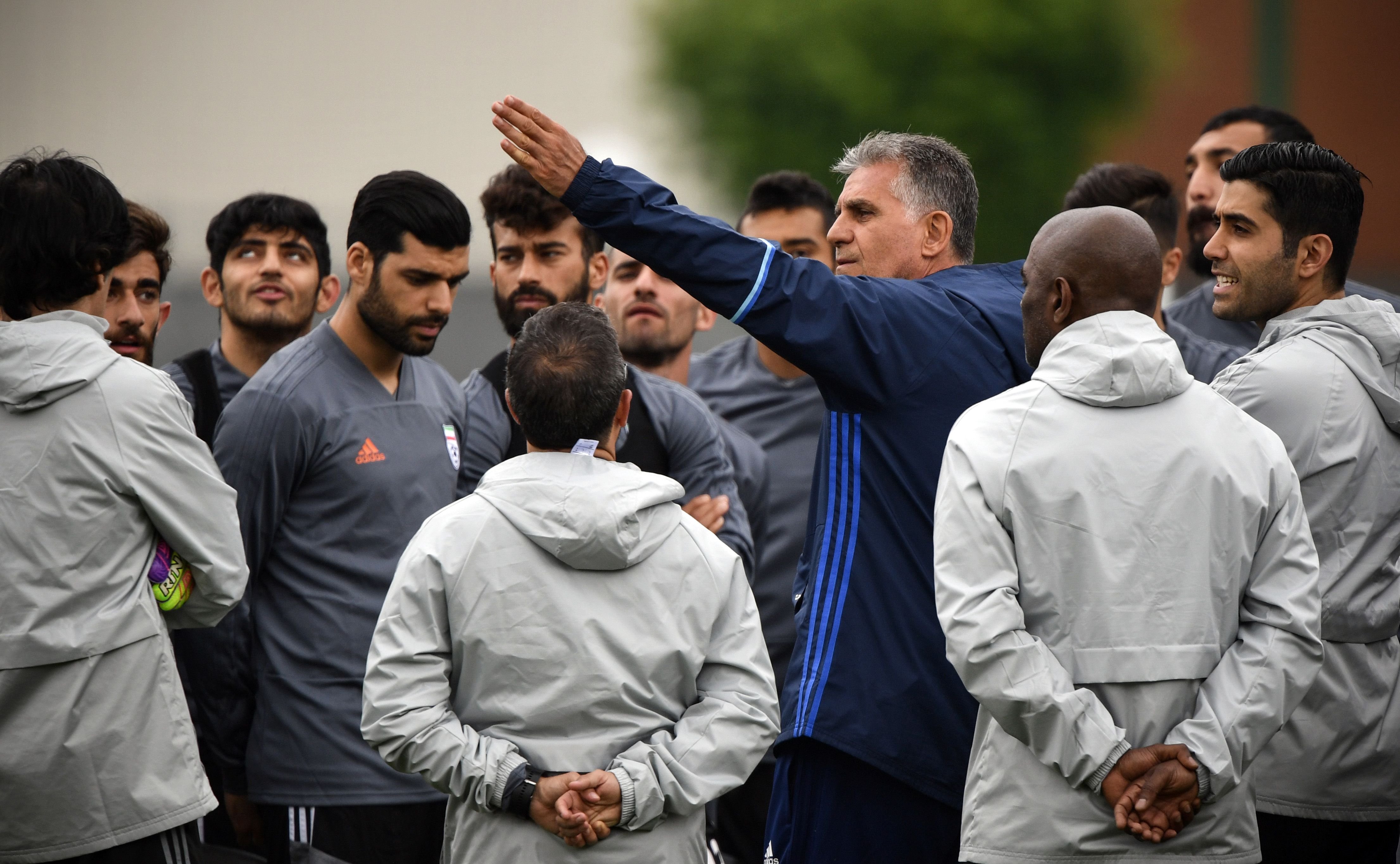 Iran's Portuguese coach Carlos Queiroz gestures as he talks to his players a training session in Bakovka outside Moscow on June 12, 2018, ahead of the Russia 2018 World Cup tournament.