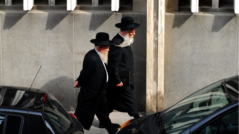 Two Orthodox Jewish men walking in Marseille