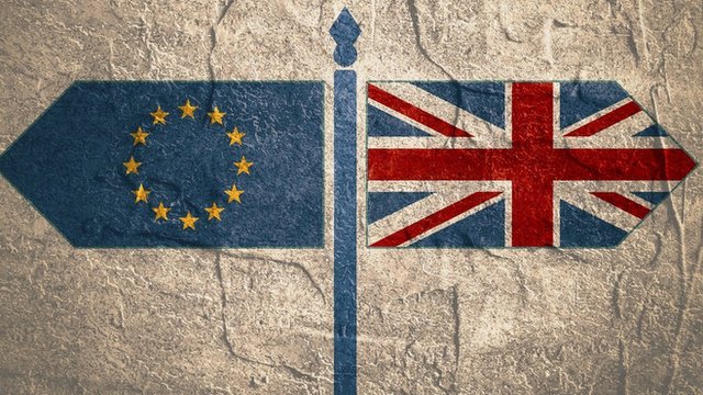 EU and UK flags pointing in opposite directions