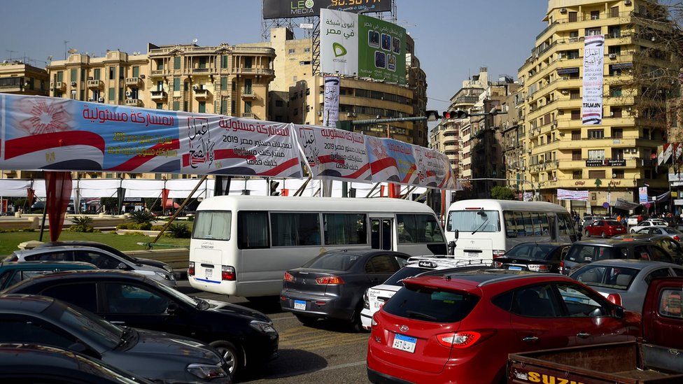 Banners in Tahrir Square, Cairo, tell Egyptians to 