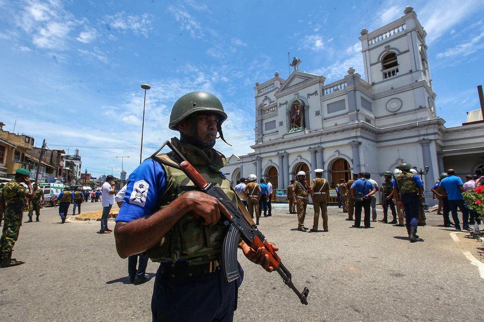 Sri Lankan security forces secure the area around St. Anthony's Shrine after an explosion hit St Anthony's Church in Kochchikade