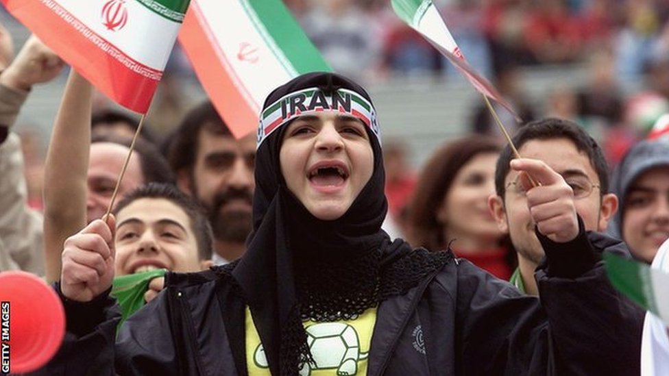 A female Iranian fan watches her team take on the USA, in the 2000 friendly match played in Pasadena