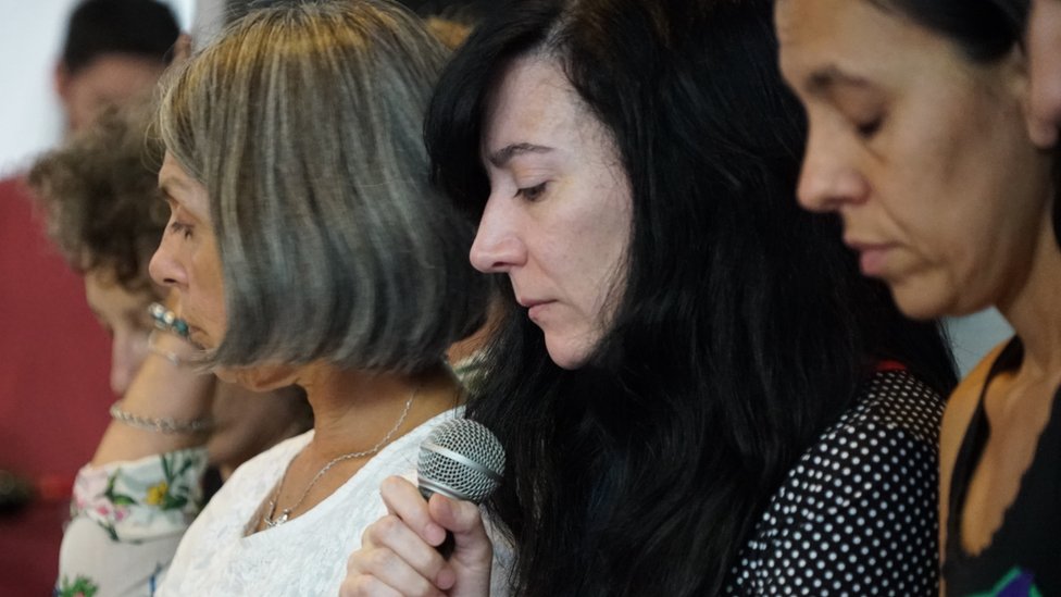 Paula reading during the presentation of the book 