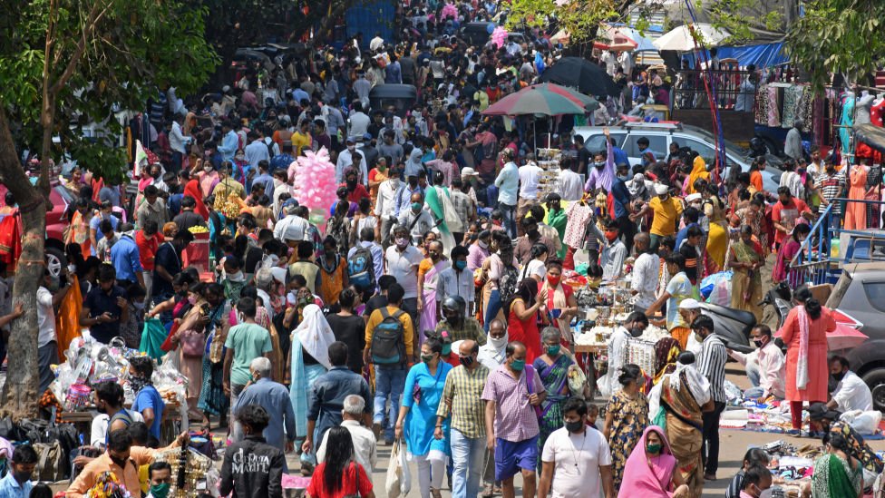 Crowds of people are seen shopping during a weekly market at Kandivali (a suburb in North-West of Mumbai)