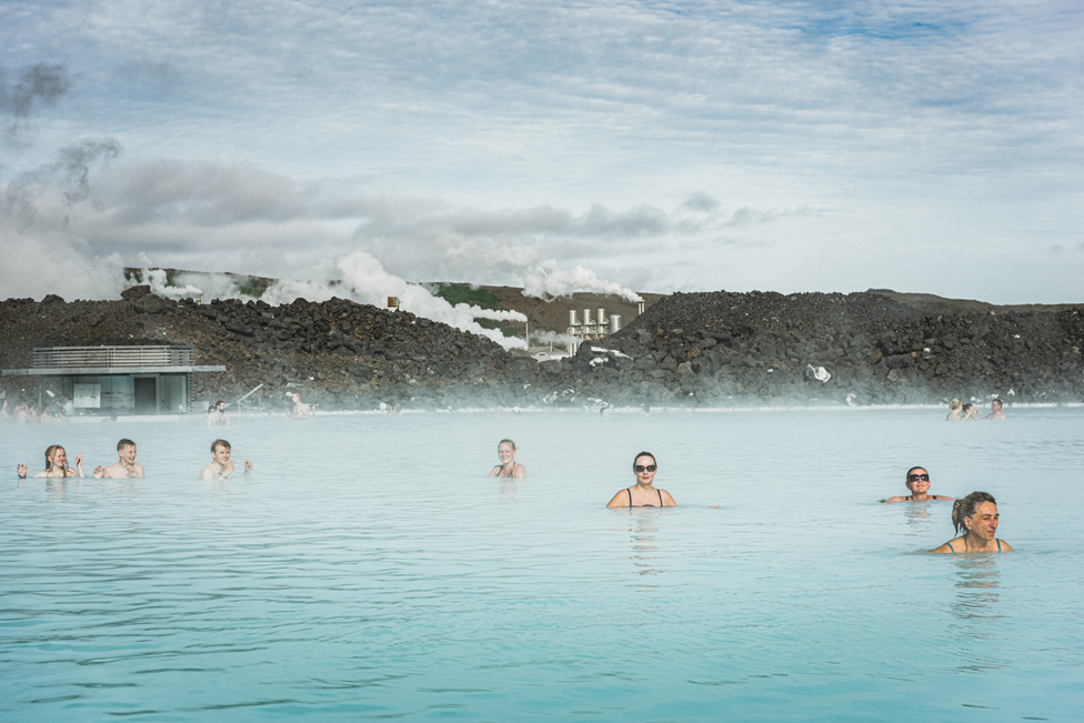 People swimming outdoors