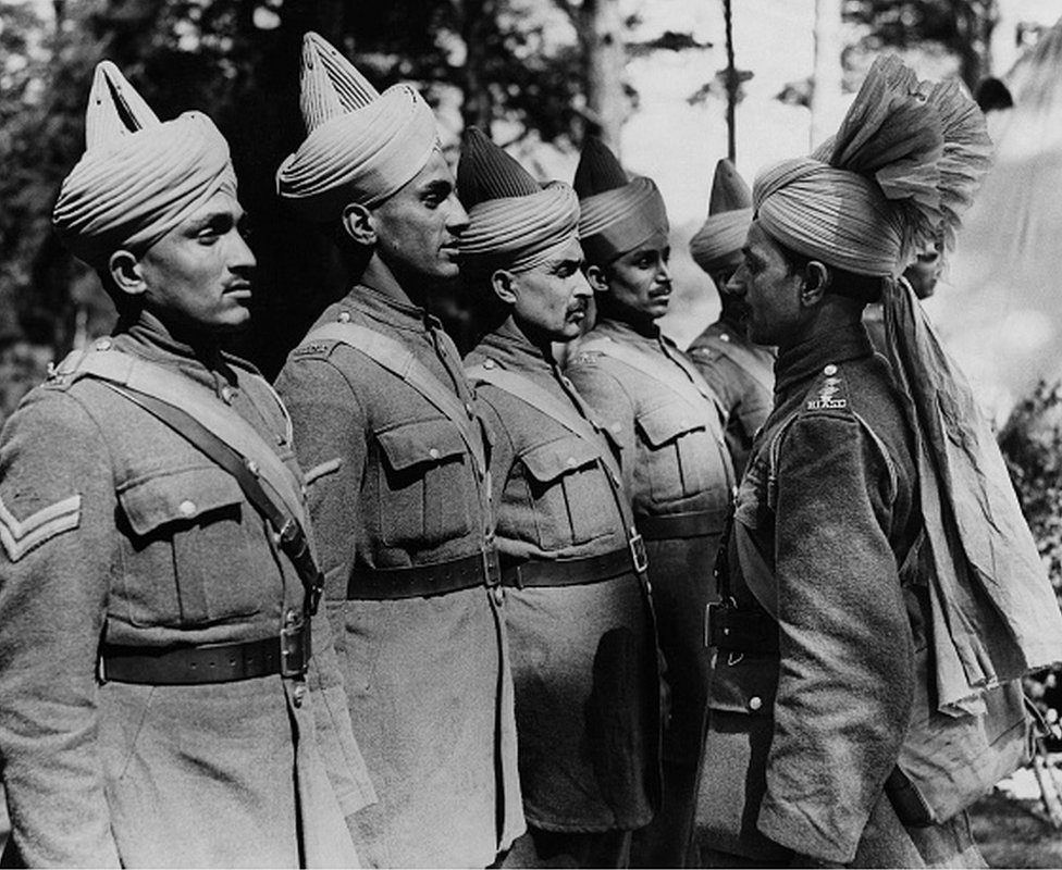 Types Of Indian Soldiers Being Inspected By Their Officer. This series of pictures were taken of the B.E.F Indian troops 