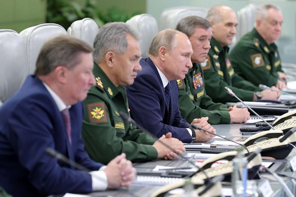 Putin and his defence chiefs watch a hypersonic missile launch via video link in 2018