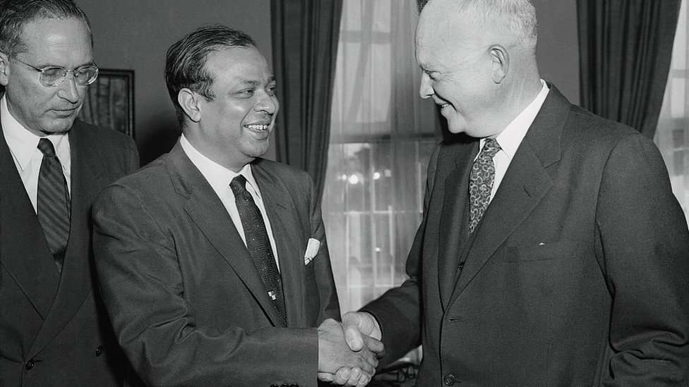 Pakistan Prime Minister Mohammed Ali is greeted by President Eisenhower upon arriving at the White House for a session expected to involve increased U.S. aid for the Moslem nation. After a half hour talk, the Prime Minister had lunch with the President.