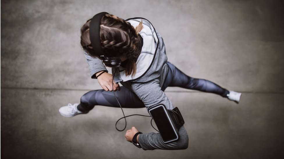 Shot from above of a woman running