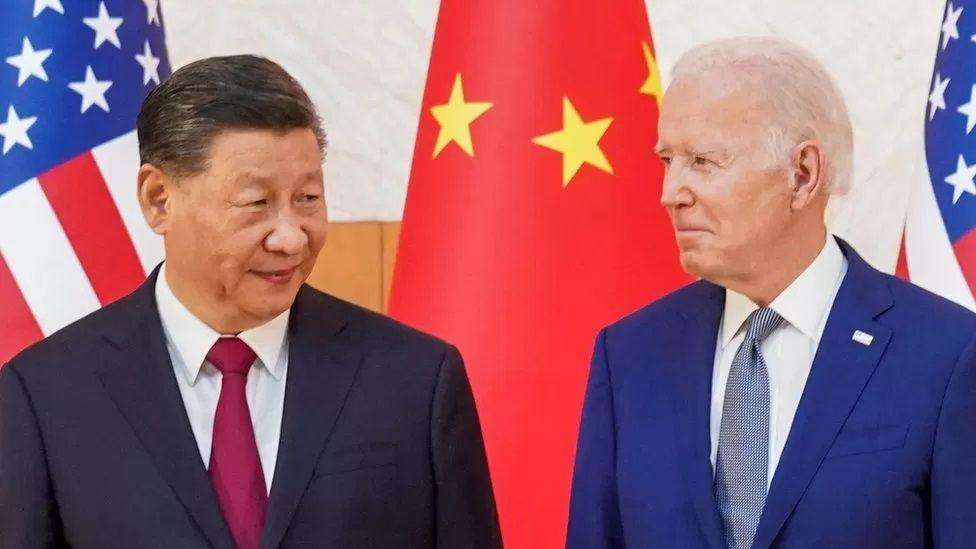 XI